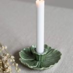 Kerzenständer in form einer Blumen klein in dark green