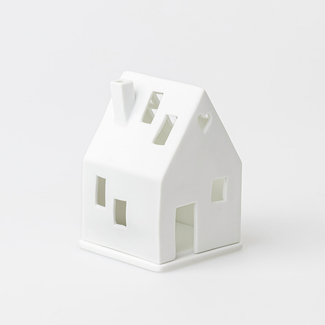 Lichthaus mit der Prägung "Liebe macht aus einem..."