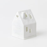 Lichthaus mit der Prägung "Liebe macht aus einem..."